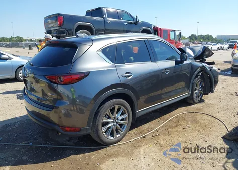 2020 Mazda Cx-5 Signature z USA, uszkodzony, nr VIN JM3KFBEY2L0835353